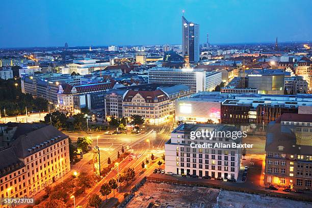 elevated cityscape of leipzig illuminated at dusk - ライプツィヒ ストックフォトと画像