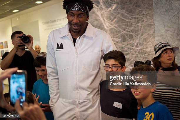 Amar'e Stoudemire a former NBA player seen reacting to childern fans during a visit to Israel Museum on August 9, 2016 in Jerusalem, Israel. Amar'e...