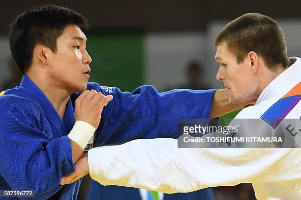 Australia's Eoin Coughlan competes with South Korea's Lee Seungsu during their men's -81kg judo contest match of the Rio 2016 Olympic Games in Rio de...