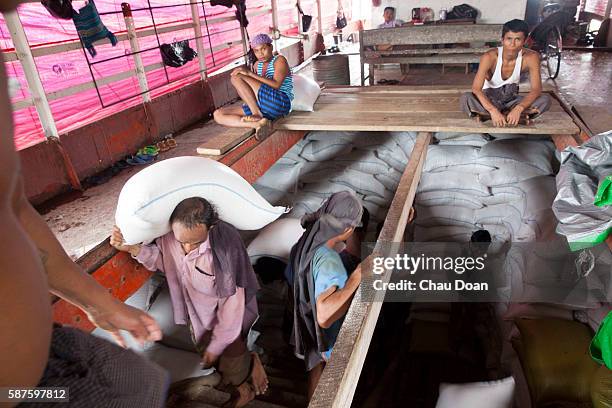 Loading Labour 160 Loading Labour Stock Photos, High-Res Pictures, and Images - Getty ...