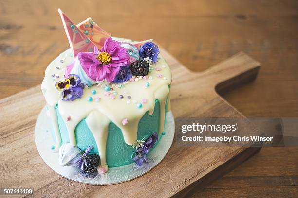 blue drip cake - decorating a cake stock pictures, royalty-free photos & images