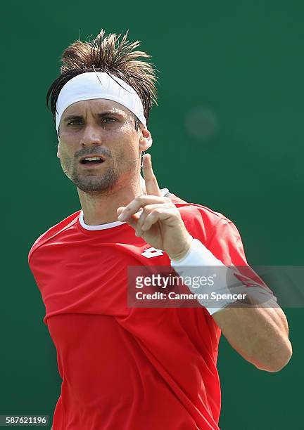 David Ferrer of Spain reacts during the men's second round single match against Evgeny Donskoy of Russia on Day 4 of the Rio 2016 Olympic Games at...