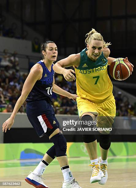 Australia's forward Penny Taylor runs for the basket by France's shooting guard Sarah Michel during a Women's round Group A basketball match between...