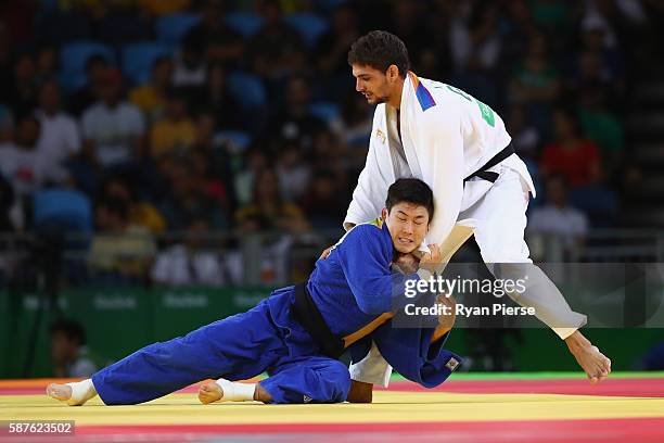 Ivaylo Ivanov of Bulgaria and Seungsu Lee of Korea compete during the Men's -81kg bout on Day 4 of the Rio 2016 Olympic Games at the Carioca Arena 2...
