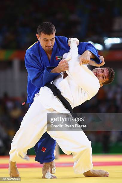 Sergiu Toma of United Arab Emirates and Victor Penalber of Brazil compete during the Men's -81kg bout on Day 4 of the Rio 2016 Olympic Games at the...