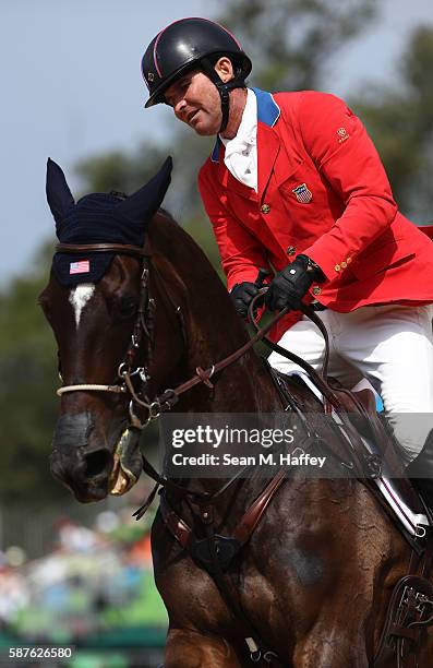 Phillip Dutton of the United States riding Mighty Nice during the eventing team jumping final and individual qualifier on Day 4 of the Rio 2016...