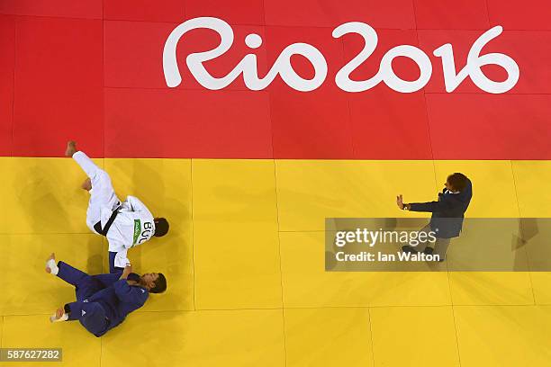 Ivaylo Ivanov of Bulgaria and Seungsu Lee of Korea compete during the Men's -81kg bout on Day 4 of the Rio 2016 Olympic Games at the Carioca Arena 2...