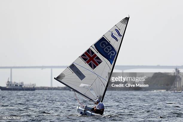Giles Scott of Great Britain competes in the Finn class race on Day 4 of the Rio 2016 Olympic Games at the Marina da Gloria on August 9, 2016 in Rio...
