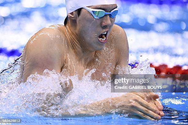 China's Li Xiang competes in a Men's 200m Breaststroke heat during the swimming event at the Rio 2016 Olympic Games at the Olympic Aquatics Stadium...