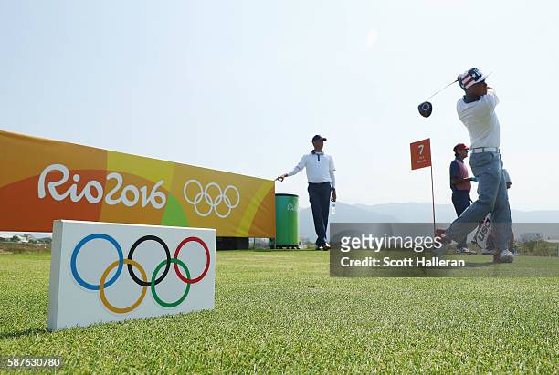 Rickie Fowler of the United States watches a tee shot during a practice round on Day 4 of the Rio 2016 Olympic Games at Olympic Golf Course on August...