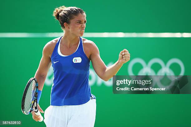 Sara Errani of Italy celebrates during the women's third round singles match against Daria Kasatkina of Russia on Day 4 of the Rio 2016 Olympic Games...