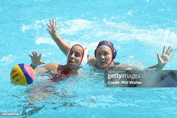 Anna Espar Llaquet of Spain and Courtney Mathewson of the United States contest the ball during the Preliminary Round, Group B Womens Waterpolo match...