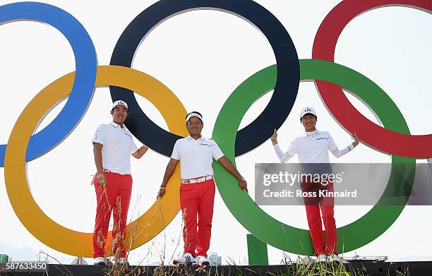 Byeong-Hun An of Korea, KJ Choi, the team leader and Jeunghun Wang of Korea during a practice round at Olympic Golf Course on August 9, 2016 in Rio...