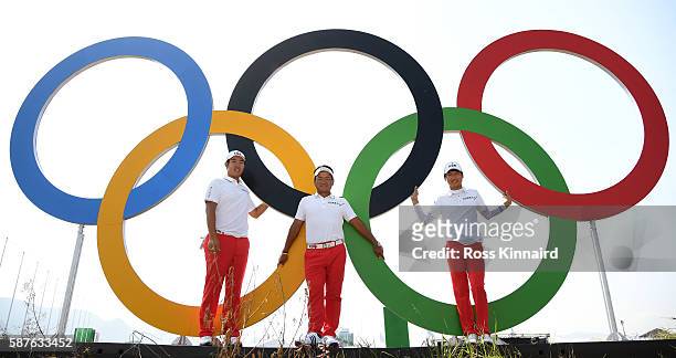 Byeong-Hun An of Korea, KJ Choi, the team leader and Jeunghun Wang of Korea during a practice round at Olympic Golf Course on August 9, 2016 in Rio...