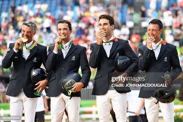 France's Karim Laghouag, France's Mathieu Lemoine, France's Astier Nicolas and France's Thibaut Vallette celebrate with their gold medals on the...