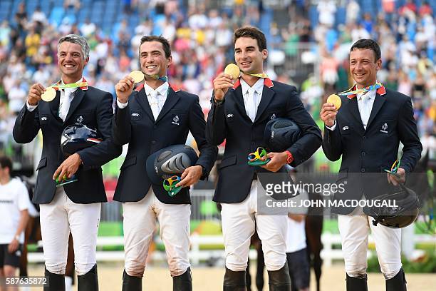 France's Karim Laghouag, France's Mathieu Lemoine, France's Astier Nicolas and France's Thibaut Vallette celebrate with their gold medals on the...