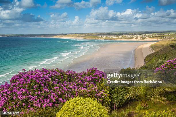 view across porthkidney sands, cornwall - cornish coast stock pictures, royalty-free photos & images