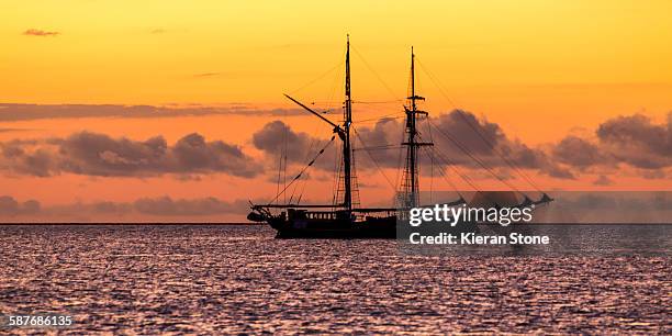 sailing into the sunset - tall ship stock pictures, royalty-free photos & images