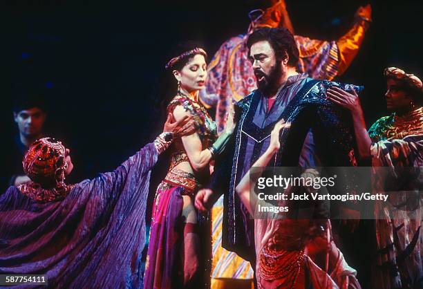 With other cast members, Italian tenor Luciano Pavarotti performs at the final dress rehearsal prior to the season premiere of the Metropolitan...