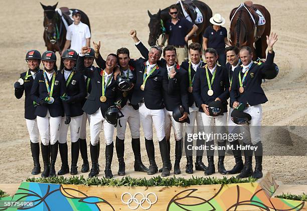 Silver medalists Julia Krajewski, Sandra Auffarth, Ingrid Klimke and Michael Jung of Germany, Gold medal medalists Karim Laghouag, Thibaut...