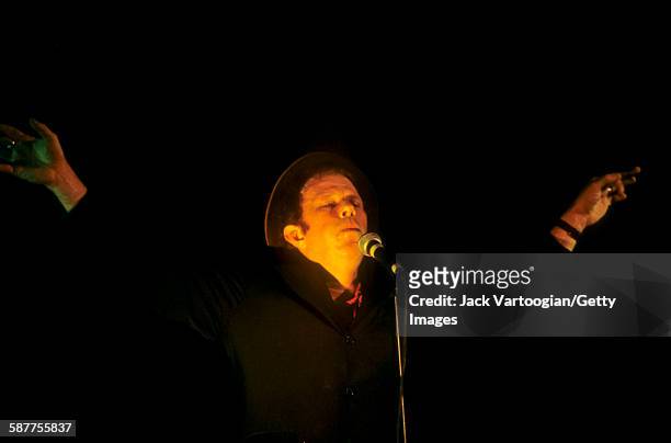 American musician Tom Waits performs at the Beacon Theater, New York, New York, September 23, 1999.
