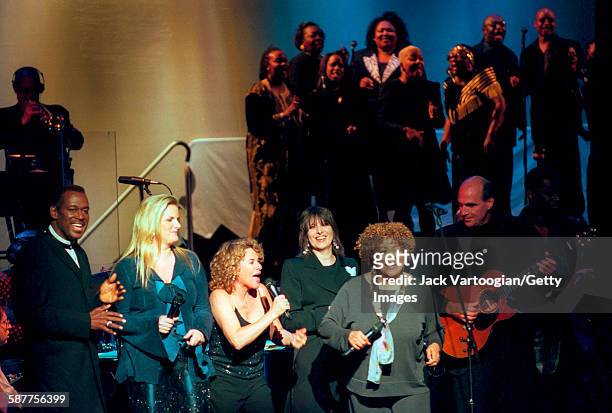 American Pop musician Carole King sings as she performs in the Theater at Madison Square Garden during People Magazine's 25th Anniversary Celebration...
