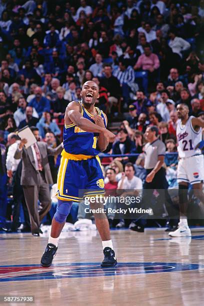 Tim Hardaway of the Golden State Warriors reacts against the Sacramento Kings circa 1993 at Arco Arena in Sacramento, California. NOTE TO USER: User...