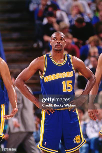 Latrell Sprewell of the Golden State Warriors looks on against the Sacramento Kings circa 1994 at Arco Arena in Sacramento, California. NOTE TO USER:...