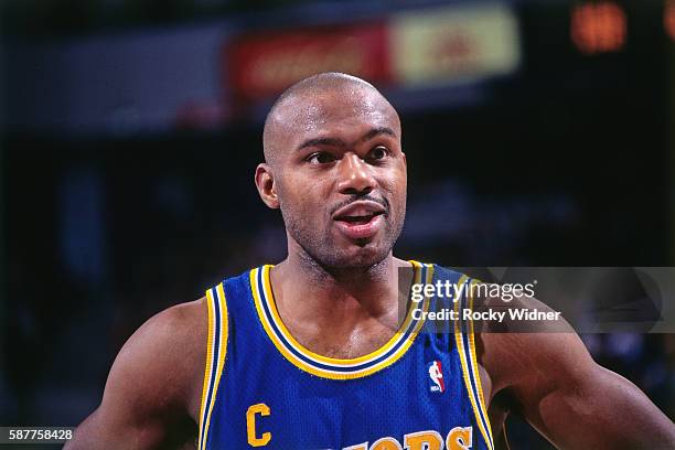 Tim Hardaway of the Golden State Warriors looks on against the Sacramento Kings circa 1995 at Arco Arena in Sacramento, California. NOTE TO USER:...