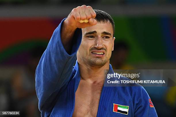 United Arab Emirates's Sergiu Toma celebrates after defeating Italy's Matteo Marconcini during their men's -81kg judo contest bronze medal A match of...