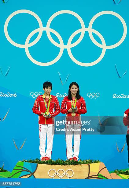 Gold medalists Ruolin Chen and Huixia Liu of China pose on the podium during the medal ceremony for the Women's Diving Synchronised 10m Platform...