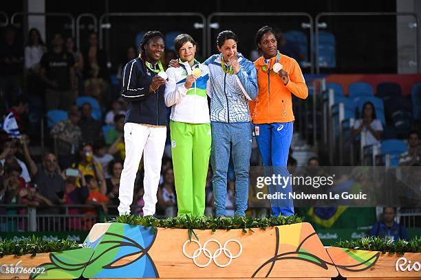 Clarisse Agbegnenou of France, Tina Trstenjak of Slovenia, Mariana Silva of Brazil and Anicka van Emden of the Netherlands compete during the Women's...