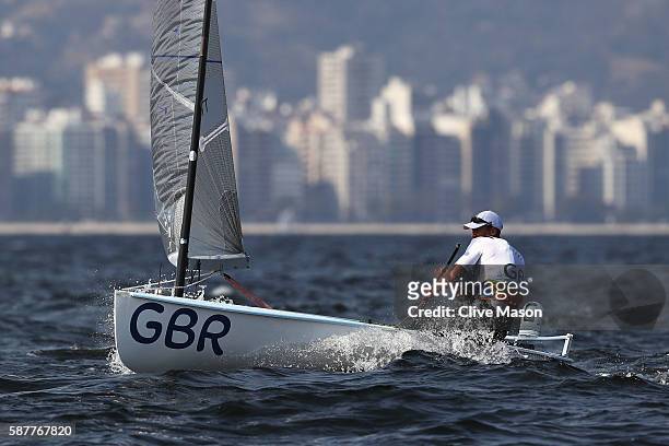 Giles Scott of Great Britain competes in the Finn class on Day 4 of the Rio 2016 Olympic Games at the Marina da Gloria on August 9, 2016 in Rio de...