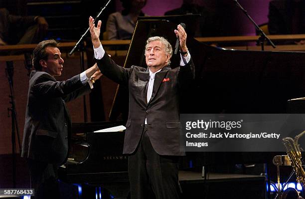 American Pop and Jazz singer Tony Bennett performs with the Lincoln Center Jazz Orchestra during the inaugural concert of the Rose Theater in...