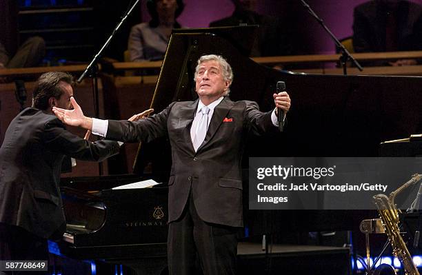 American Pop and Jazz singer Tony Bennett performs with the Lincoln Center Jazz Orchestra during the inaugural concert of the Rose Theater in...