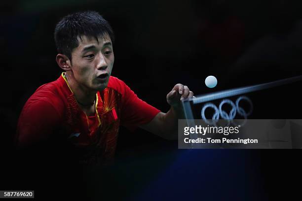 Jike Zhang of China competes against Koki Niwa of Japan during the Men's Singles Quarterfinal 4 Table Tennis on Day 4 of the Rio 2016 Olympic Games...