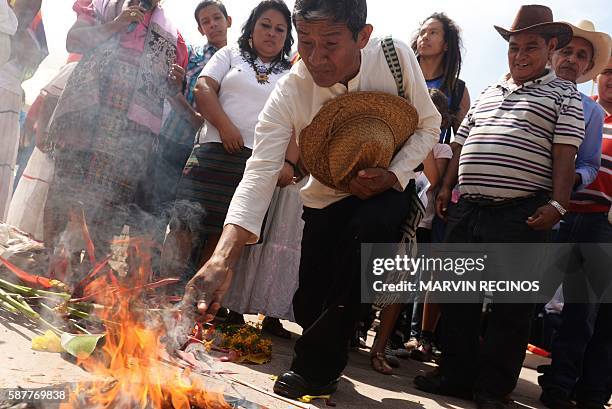 Nahua Pipil indigenous man participates in a ceremony commemorating the International Day of the World's Indigenous Peoples at El Salvador del Mundo...