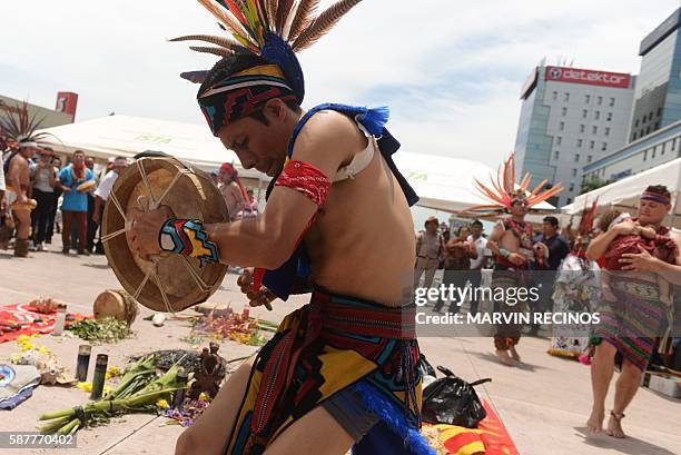 Members of the Nahua Pipil indigenous people participate in a ceremony commemorating the International Day of the World's Indigenous Peoples at El...