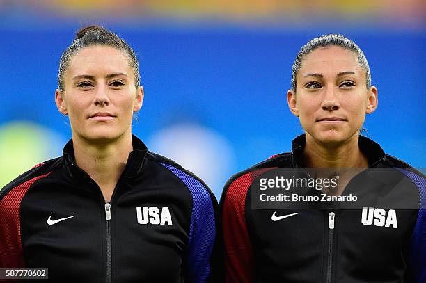 Ali Krieger and Christen Press of United States prepare for their game against Colombia in the Women's Football First Round Group G match on Day 4 of...
