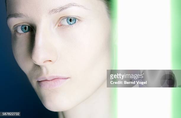 woman with pensive expression - lightskinned stock pictures, royalty-free photos & images