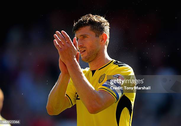 John Mousinho of Burton Albion applauds the fans at the end of the Sky Bet Championship match between Nottingham Forest and Burton Albion at City...