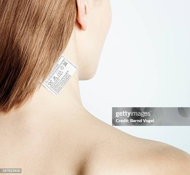 woman with tag on neck - skin tag stock pictures, royalty-free photos & images