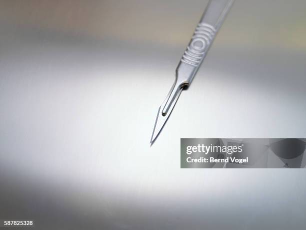 sharp surgical scalpel - surgical tray stock pictures, royalty-free photos & images