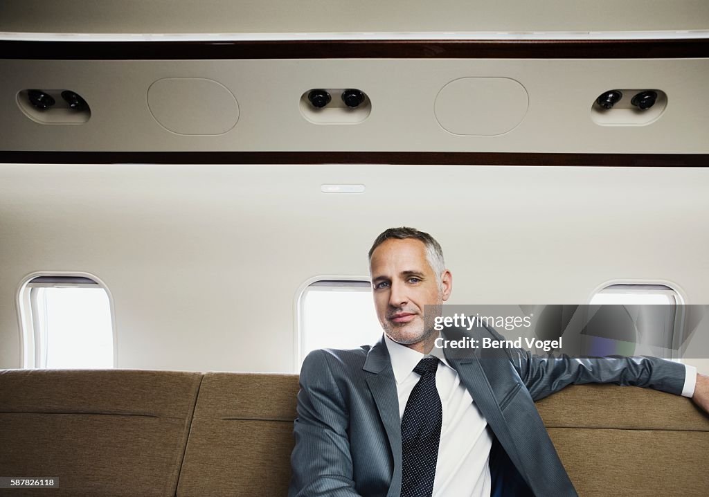 Executive on corporate airplane