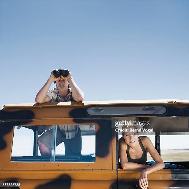 couple on safari vacation - hot wife stockfoto's en -beelden
