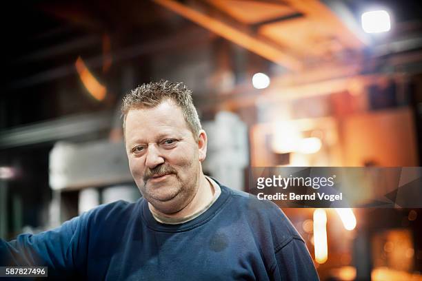 portrait of steel worker in factory - industry 40 stock pictures, royalty-free photos & images
