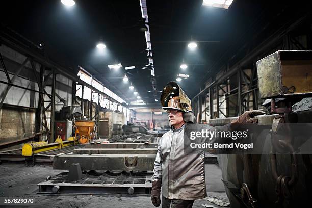 steel worker - industrial labourer stock pictures, royalty-free photos & images