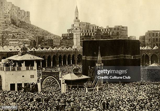 Pilgrims at the Kaaba, Mecca, Saudi Arabia, the most sacred site in the Islamic religion. .
