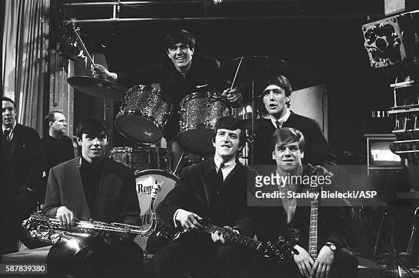 Dave Clark 5 pose for a group portrait on the set of TV show Ready Steady Go, Kingsway Studios, London, February 1964. L-R Dave Clark, Mike Smith,...