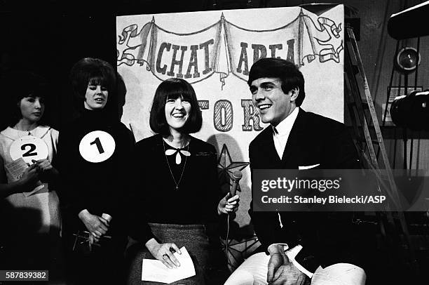 Dave Clark is interveiwed by presenter Cathy McGowan on the set of TV show Ready Steady Go, Kingsway Studios, London, February 1964.